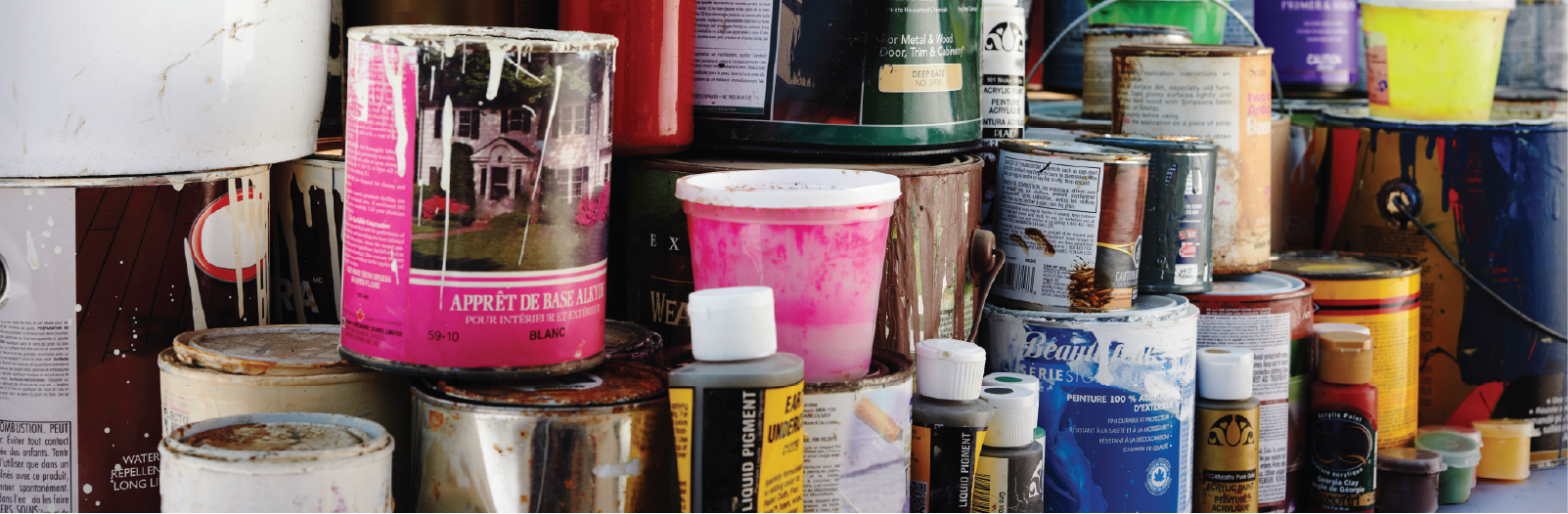 pile of paint cans