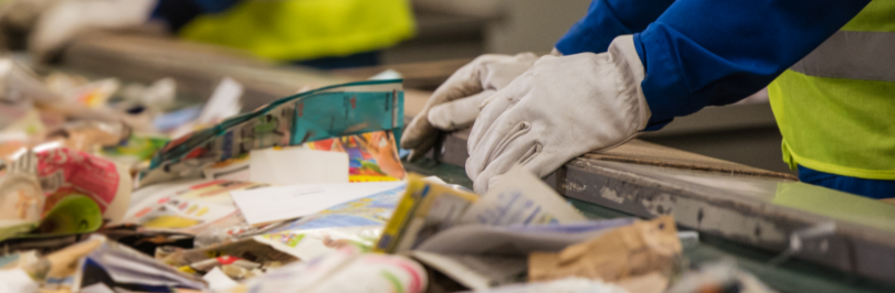 worker sorting recycling