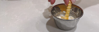 French fry in dipping sauce