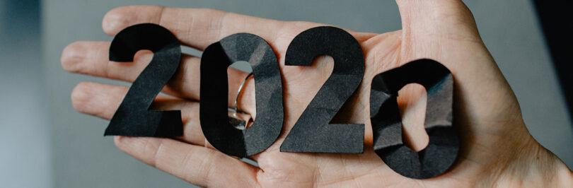 2020 paper cutout in hand