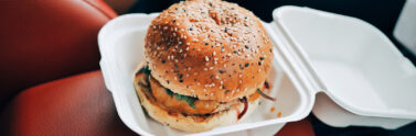 burger in a to-go container