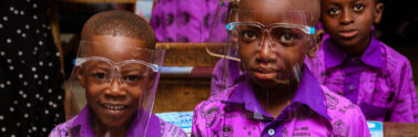 Children wearing face shields