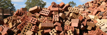 Old broken bricks in a pile outdoors
