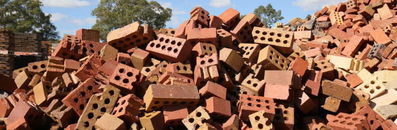 Old broken bricks in a pile outdoors
