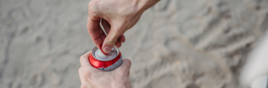person opening a can