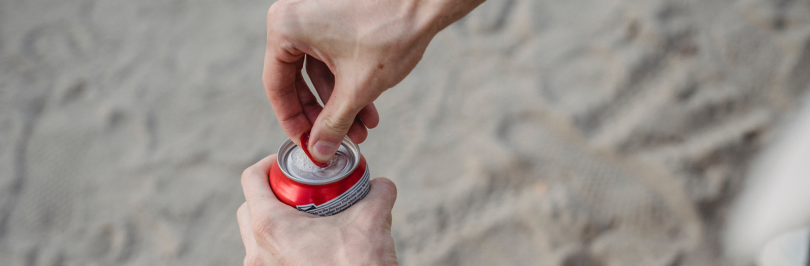 person opening a can